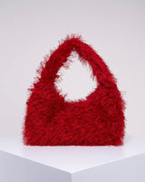 Red fuzzy bag